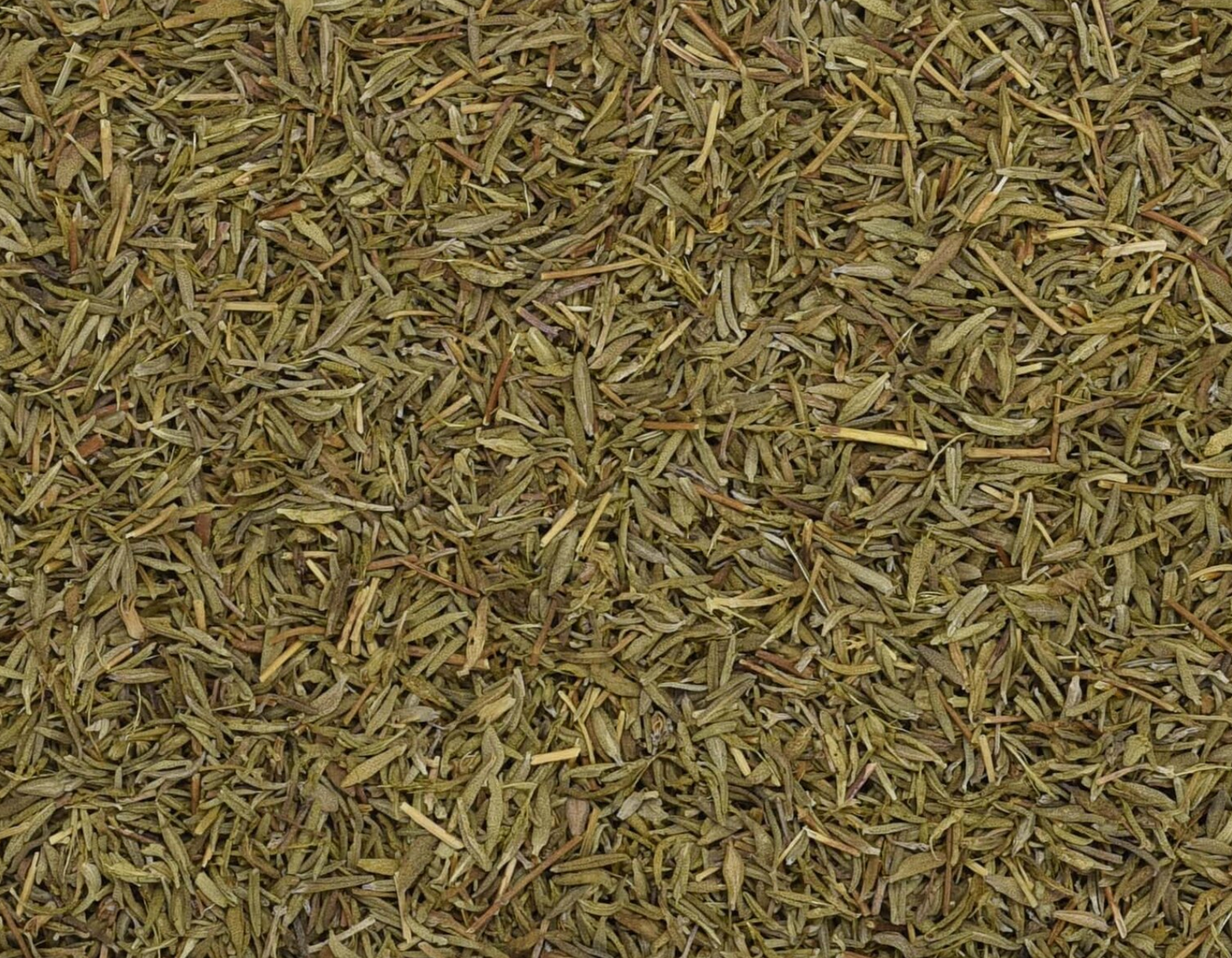 Close-up of dried thyme herb, showing tiny green leaves used for teas and herbal remedies.